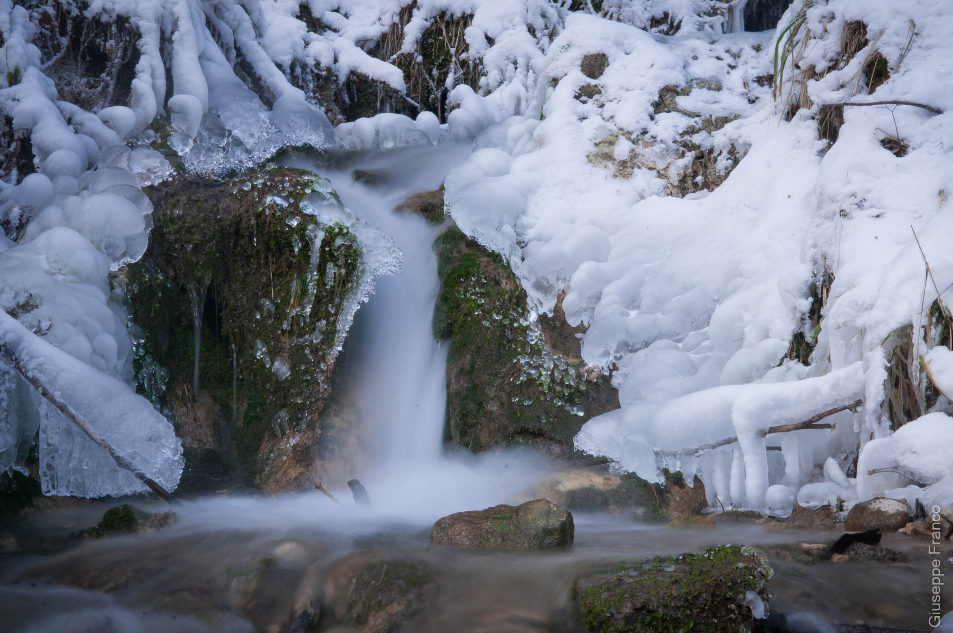Long exposure of a half frozen stream.